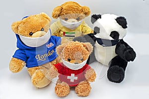 toy bears in protective masks photo