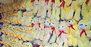 Teddy bears and ducks plush toys as prizes at a carnival, fun fair or amusement park