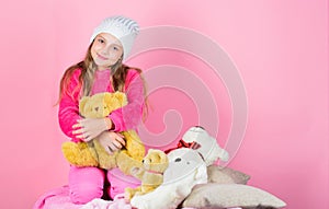 Teddy bears improve psychological wellbeing. Unique attachments to stuffed animals. Kid little girl play with soft toy