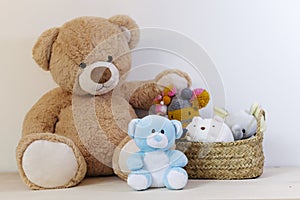 Teddy bears with a stuffed toys and basket