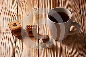 Tee and cookies on a wooden table