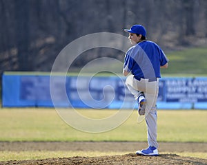 Teen baseball pitcher