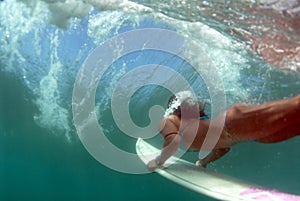 Teen Bikini Surfer Duckdiving