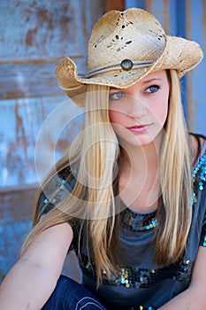 Teen Blond Model with Cowboy Hat and Blue Eyes