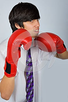 Teen in boxing gloves