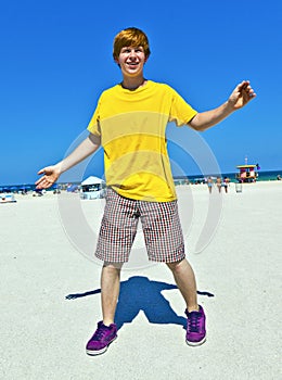 Teen boy at the beach in South Miami photo