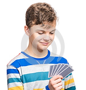 Teen boy with gamble cards