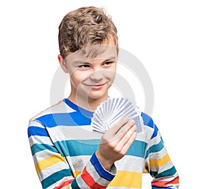 Teen boy with gamble cards