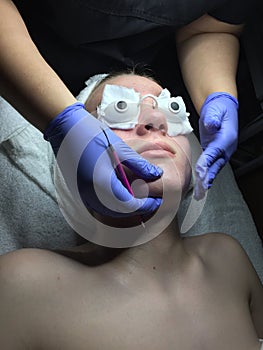 Teen boy getting facial