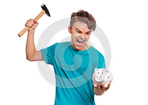 Teen boy holding piggy bank