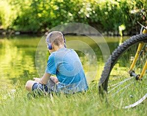 Teen boy at lakeside