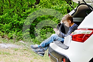 Teen boy   with phone