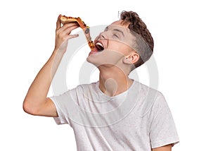 Teen boy with pizza