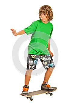 Teen boy on skateboard