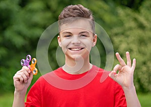 Teen boy with spinner