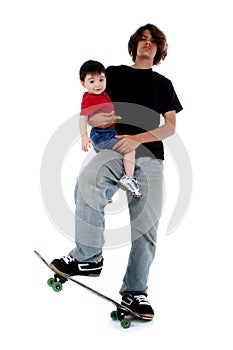 Teen Boy and Toddler Boy on Skateboard