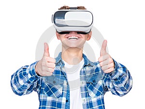 Teen boy in VR glasses