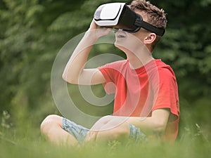 Teen boy with VR glasses