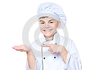 Teen boy wearing chef uniform
