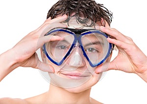 Teen boy wearing mask