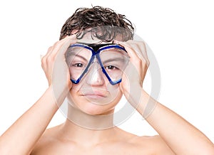 Teen boy wearing mask