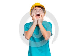 Teen boy with yellow hard hat