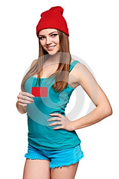 Teen bright girl holding credit card