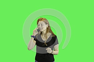 Teen on cell phone green screen