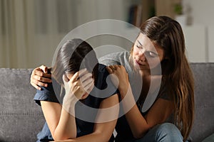 Teen comforting hes sad friend in the night