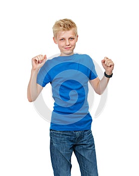 Teen confidence. Cropped studio portrait of a blond teenage boy standing against a white background.