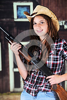 Teen Cowgirl with a Gun