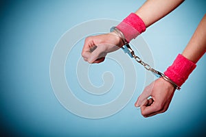 Teen crime - teenager girl in handcuffs