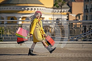 teen fashion girl after shopping in fall. autumn shopping sale. teenage girl go shopping in autumn fashion. shopping