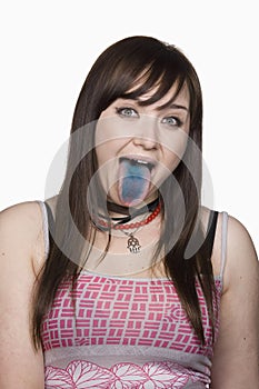 Teen Girl with a Blue Tongue. Isolated.
