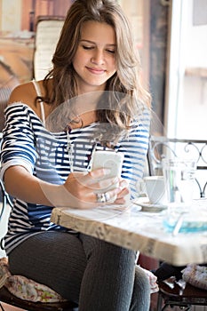 Teen girl in cafe