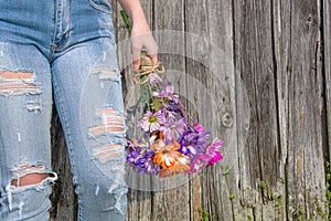 Teen girl with daisy bouquet