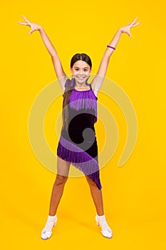 Teen girl dancing rumba, samba cha-cha-cha. Ballroom dance school for teenager kids girl. Dress movement. Ballroom sport