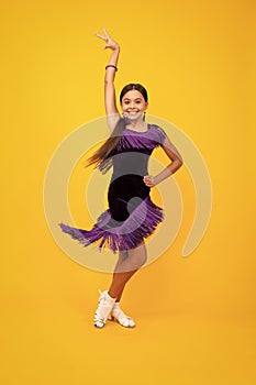 Teen girl dancing rumba, samba cha-cha-cha. Ballroom dance school for teenager kids girl. Dress movement. Ballroom sport