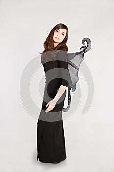 Teen girl in dark fairy costume