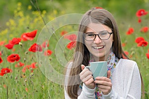 Teen girl drink cup of tea