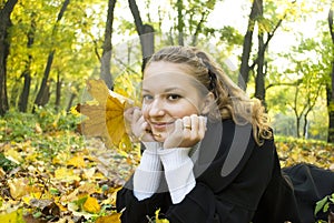 Teen girl enjoys autumn nature