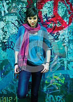 Teen girl in front of peace sign