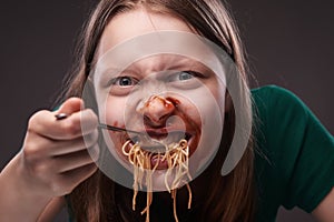 Teen girl furiously eating