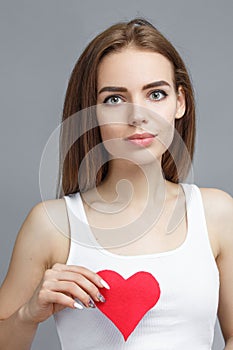 Teen girl hold red heart. valentine day