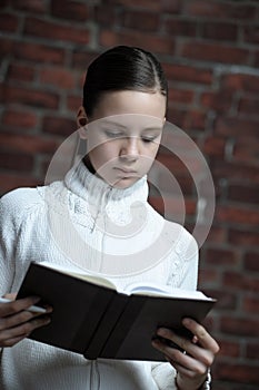 Teen girl holding a diary