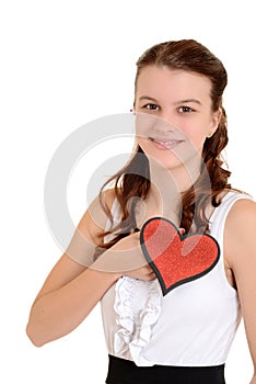 Teen girl holding glitter heart