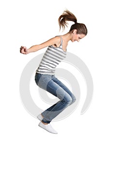 Teen girl jumping.