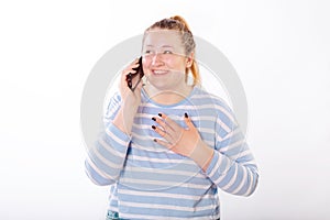 Teen girl laughing and talking on the phone