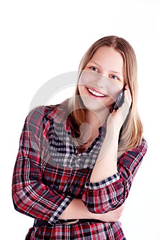 Teen girl laughing and talking on the phone