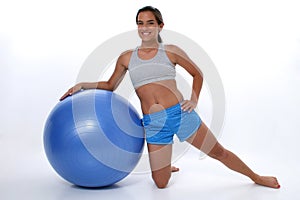 Teen Girl Leaning On Exercise Ball